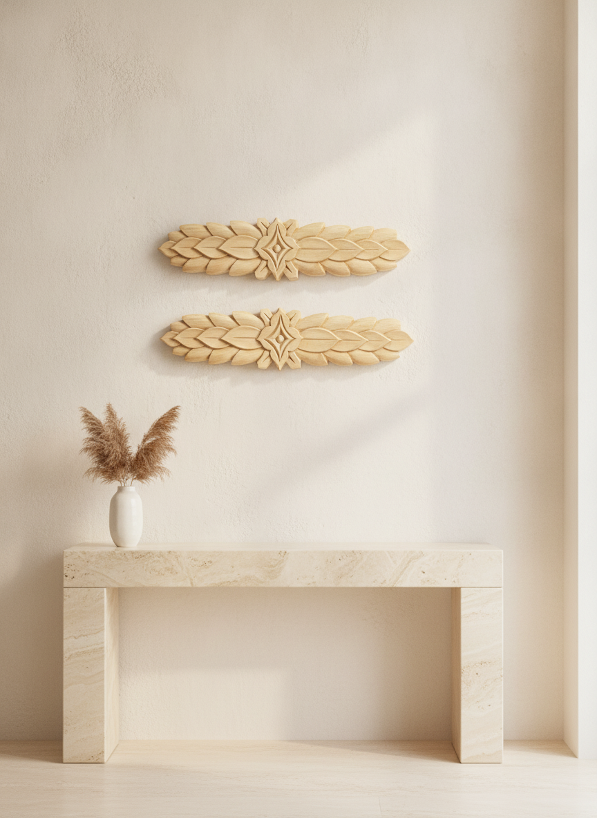 Carved Acanthus and Laurel wood friezes mounted on a wall